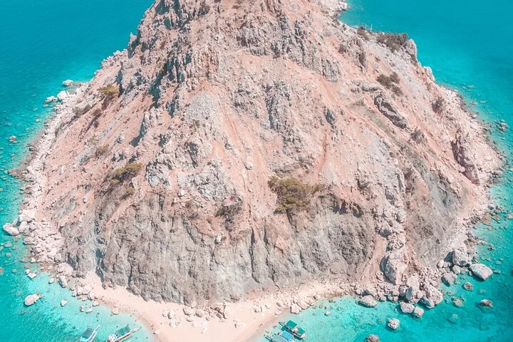 Day Tour to Suluada by Boat