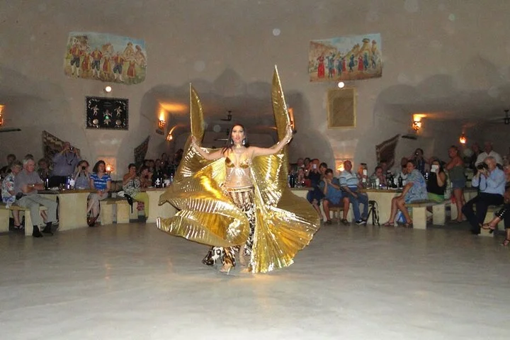 Dinner with traditional dance shows in cave restaurants