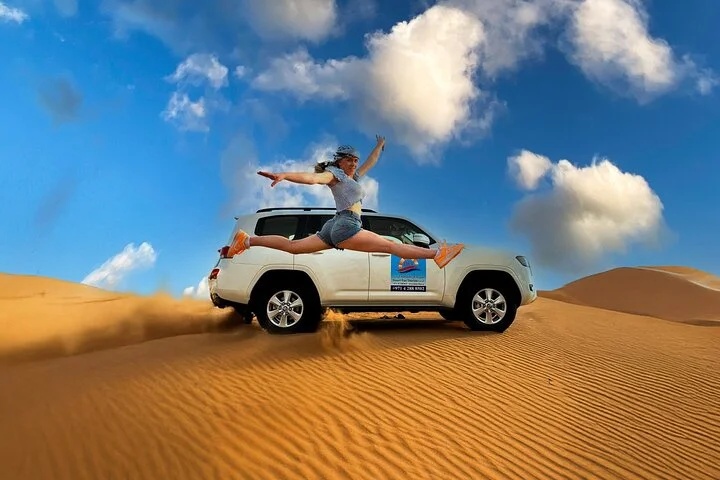 4 Hours Dubai Desert Experience: Camel + Sandboard + Falcon Photo