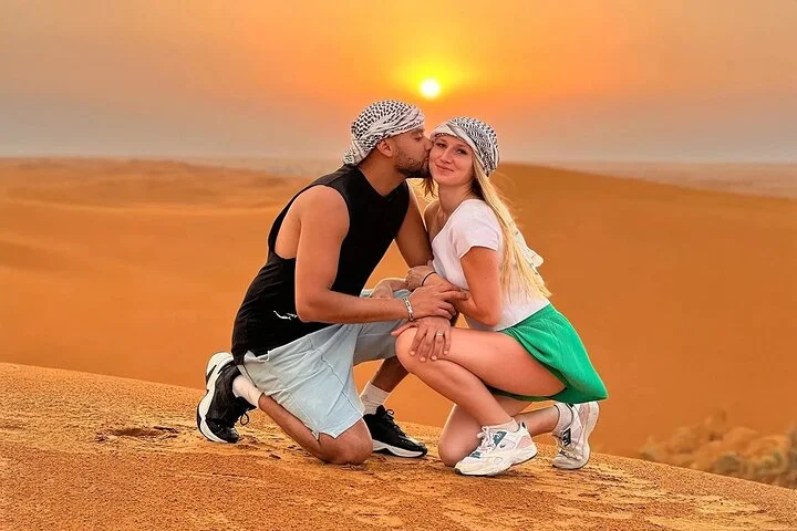 4 Hours Dubai Desert Experience: Camel + Sandboard + Falcon Photo