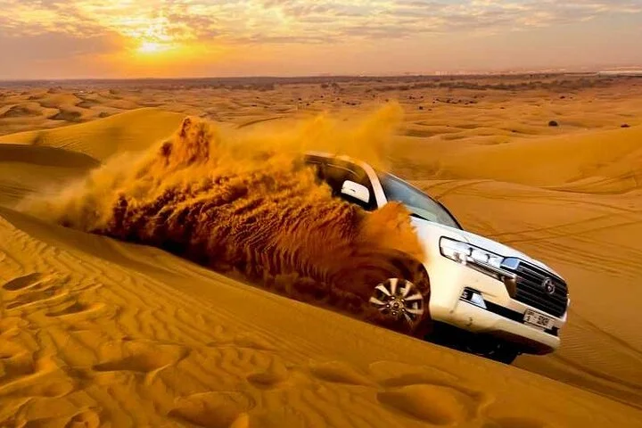 4X4 Dubai Desert Safari with BBQ Dinner and Lot More