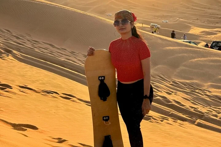 Camel Ride with Sand Boarding at Red Dunes