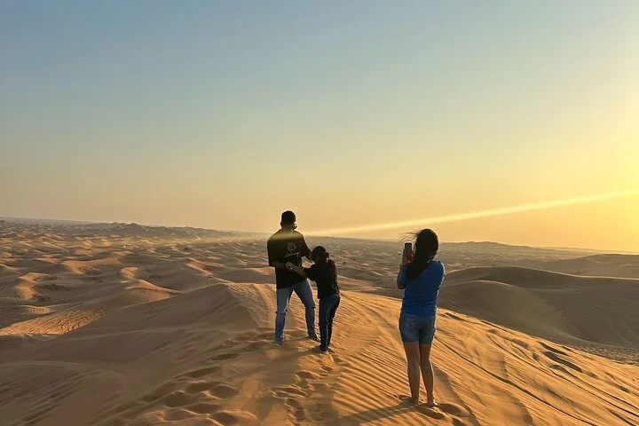 Camel Ride with Sand Boarding at Red Dunes