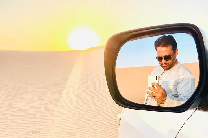 Camel Ride with Sand Boarding at Red Dunes