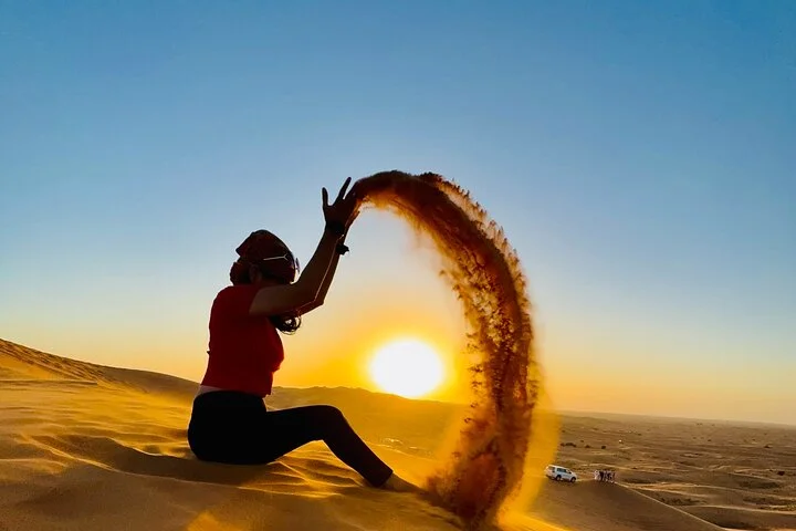 Camel Ride with Sand Boarding at Red Dunes