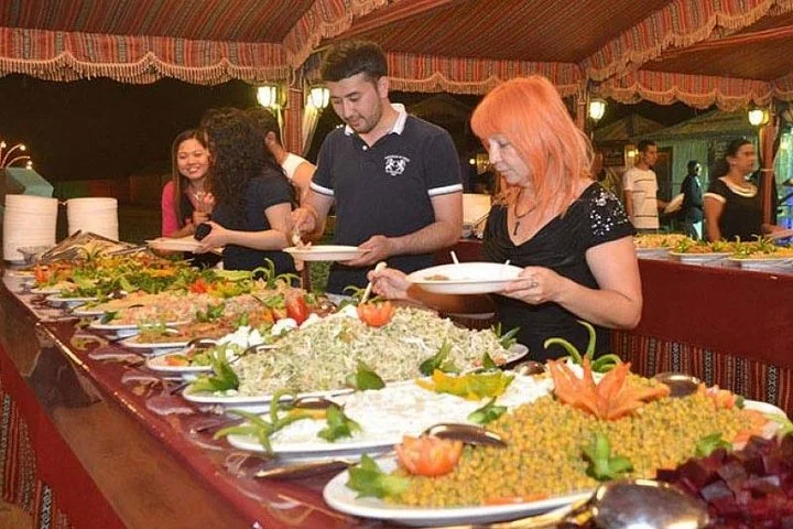 Camel Rock Desert safari Dubai with bbq Dinner camel ride sand boarding & more