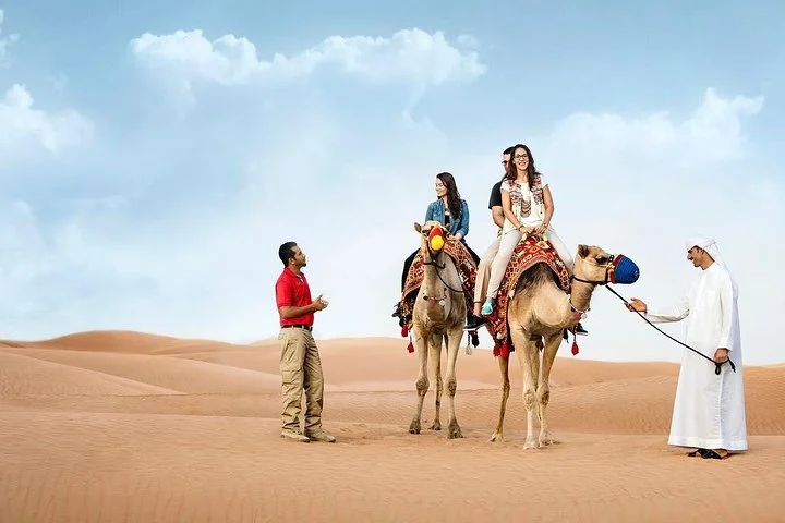 Camel Rock Desert safari Dubai with bbq Dinner camel ride sand boarding & more