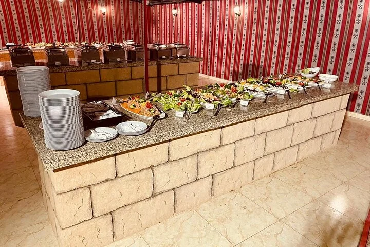 Deluxe Sunset Desert Safari: SandSurfing, Camel Ride & BBQ dinner