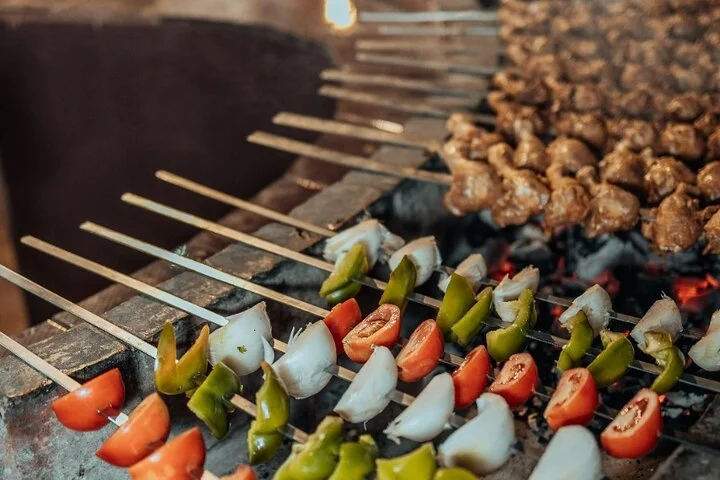 Deluxe Sunset Desert Safari: SandSurfing, Camel Ride & BBQ dinner