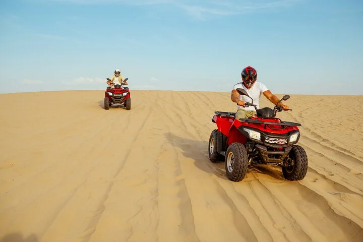 Desert Safari Quad Bike and Camel Experience with BBQ Dinner