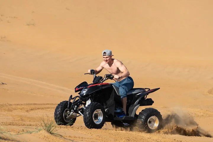 Desert Safari Quad Bike and Camel Experience with BBQ Dinner