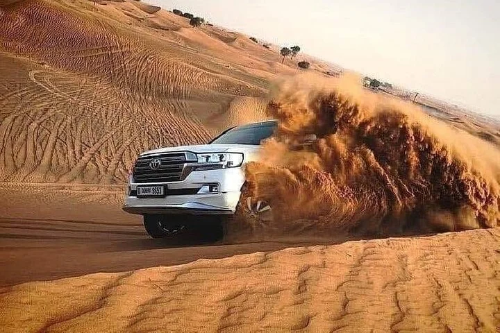Desert Safari With BBQ Dinner, Camel Ride, Sand Boarding In Dubai
