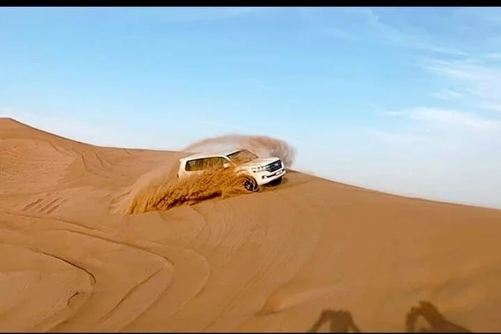 Desert Safari With BBQ Dinner, Camel Ride, Sand Boarding In Dubai