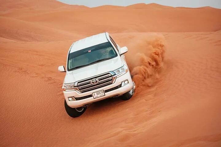 Dubai Desert Safari 4x4 Dune Bashing with BBQ and Live Show