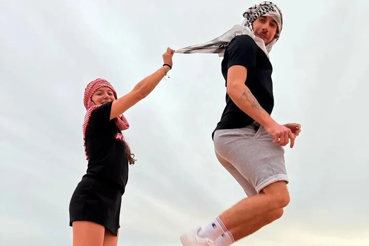 Dubai Desert Safari Dune Bashing, Camel Ride, and BBQ Dinner