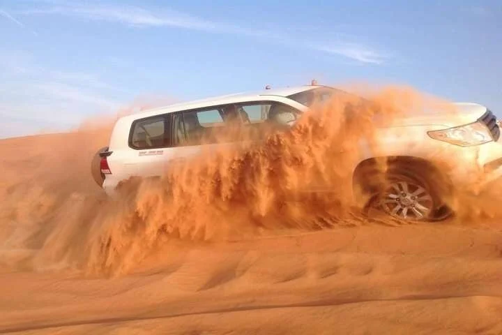 Dubai Desert Safari in Red Dunes with 4×4 BBQ Dinner & Camel Ride