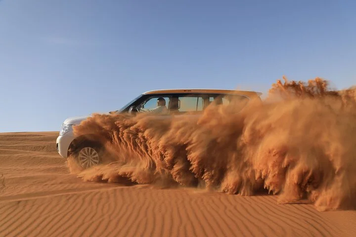 Dubai Desert Safari with BBQ, Camel Ride, Sand Board, Live Shows
