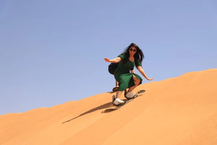 Dubai Desert Safari with BBQ, Camel Ride, Sand Board, Live Shows