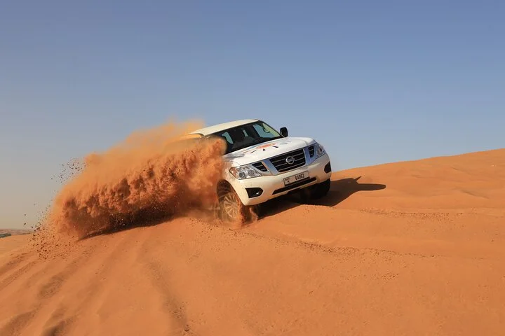 Dubai Desert Safari with BBQ, Camel Ride, Sand Board, Live Shows