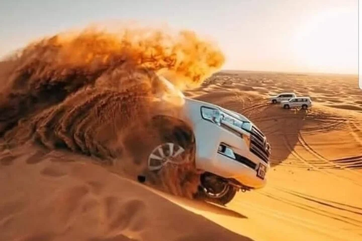 Dubai Desert Safari with Camel Ride, Sand surf, & BBQ Dinner