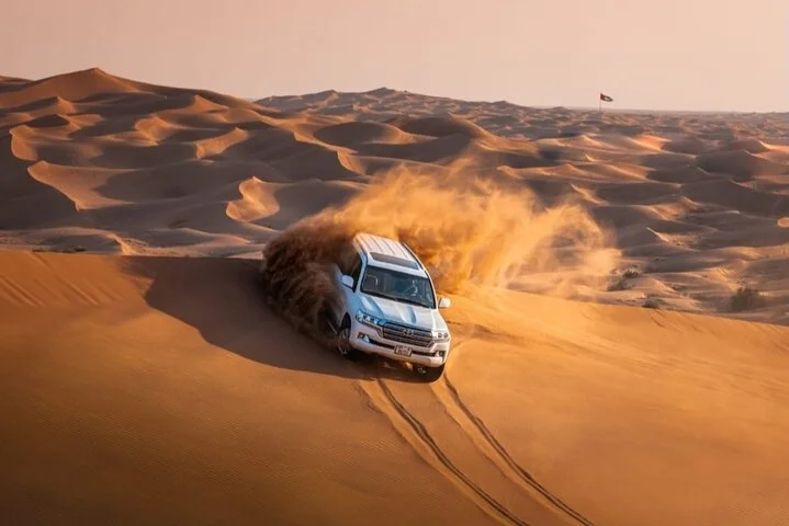 Dubai Desert Safari with Camel Ride, Sand surf, & BBQ Dinner