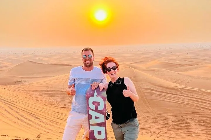 Dubai Desert Safari with Camel Ride, Sand surf, & BBQ Dinner