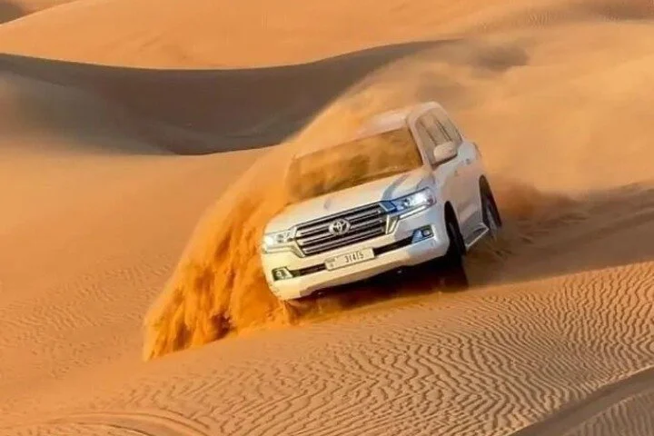Dubai Desert Safari with Dune Bashing, Camel Ride and BBQ Dinner