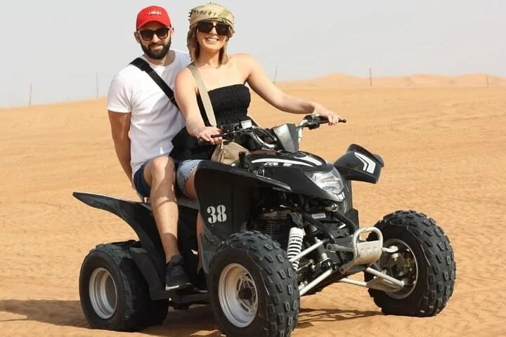 Dubai Desert Safari with Quad Bike, Camel Ride, Sandboard and BBQ