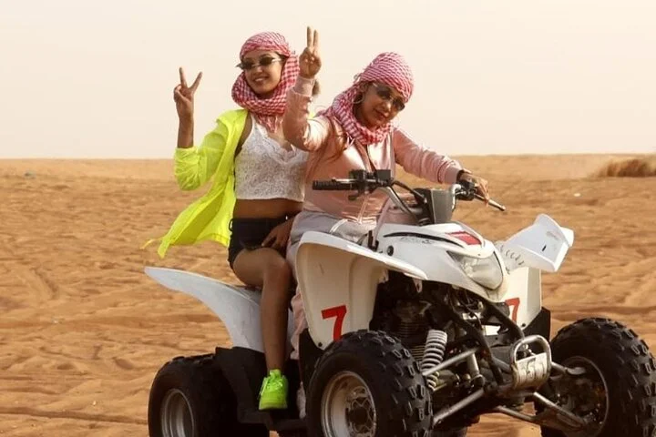 Dubai Desert Safari with Quad Bike, Camel Ride, Sandboard and BBQ