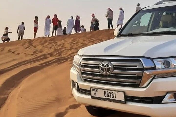 Dubai Desert Safari with Quad Bike, Camel Ride, Sandboard and BBQ
