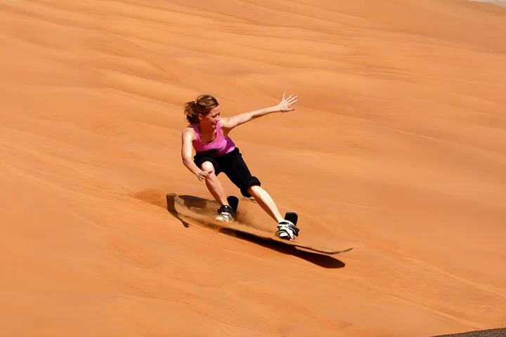 Dubai Desert Safari with Quad Bike, Sand Boarding & BBQ Dinner