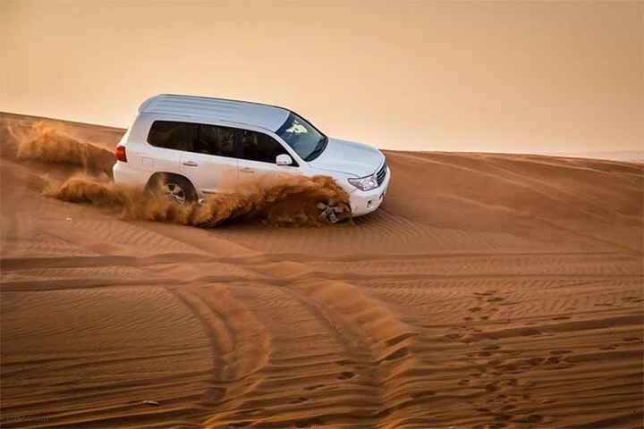 Dubai Desert Safari with Self Drive Quad Biking & Camel Riding