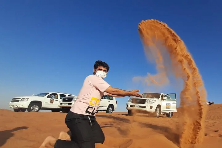 Dubai Dune Bashing Tour with Quad Bike, Sandboarding, Camel Ride