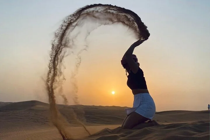 Dubai Dune Bashing Tour with Quad Bike, Sandboarding, Camel Ride