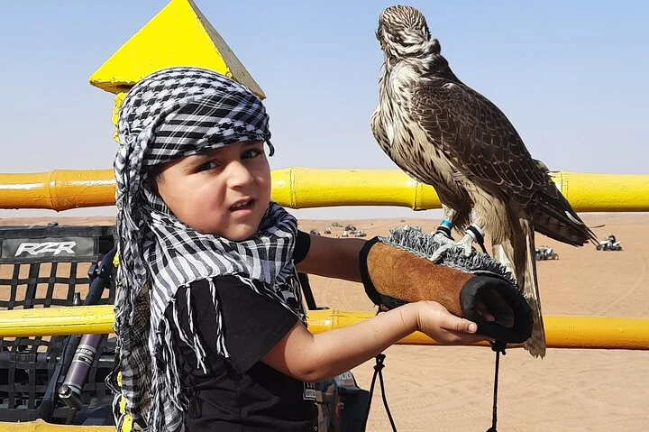 Dubai Dune Bashing Tour with Quad Bike, Sandboarding, Camel Ride