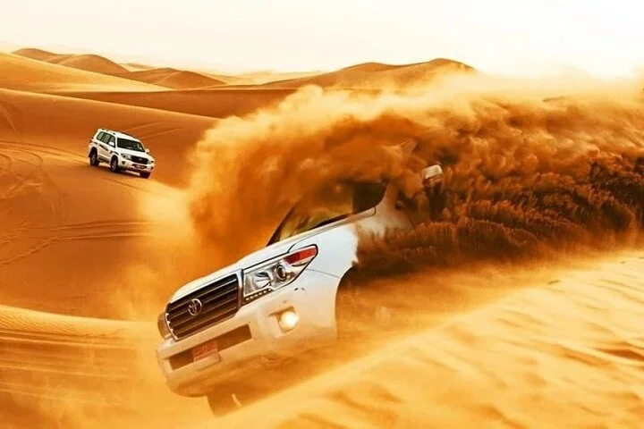 Dubai Evening Desert Safari with Dune Bashing BBQ Dinner and Show