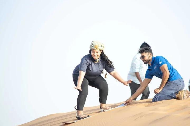 Dubai Half-day Red Dunes bashing with Sandboarding, Camel &Falcon