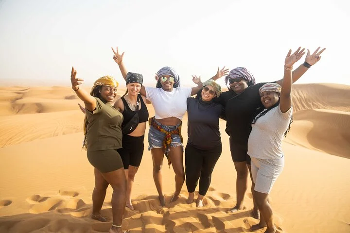 Dubai Half-day Red Dunes bashing with Sandboarding, Camel &Falcon