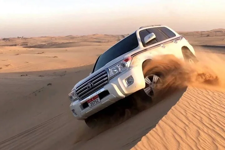 Dubai Morning Desert Safari: Camel Ride & Sandboarding!
