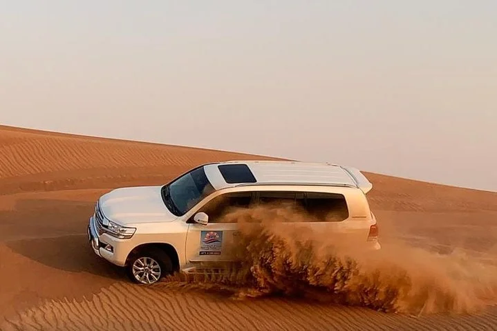 Dubai Morning Desert Safari: Camel Ride & Sandboarding!