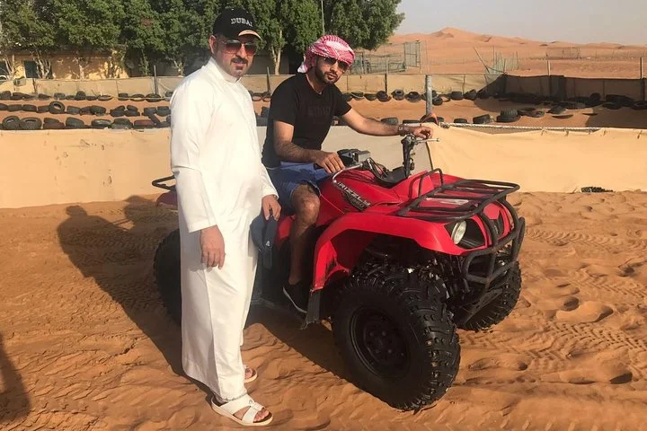 Dubai Morning Desert Safari with Quad Bike, Camel & Dune Bashing