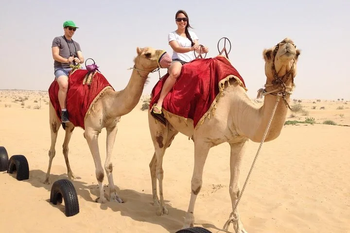 Dubai Morning Desert Safari with Quad Bike, Camel & Dune Bashing
