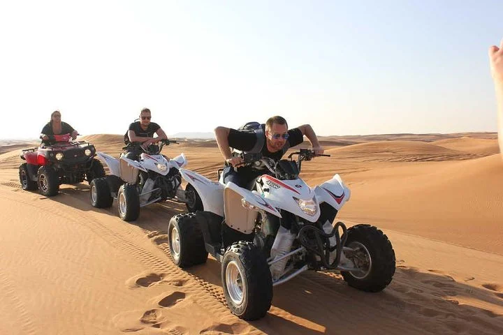 Dubai Morning Safari: Quad Biking, Sandboarding & Camel Ride!