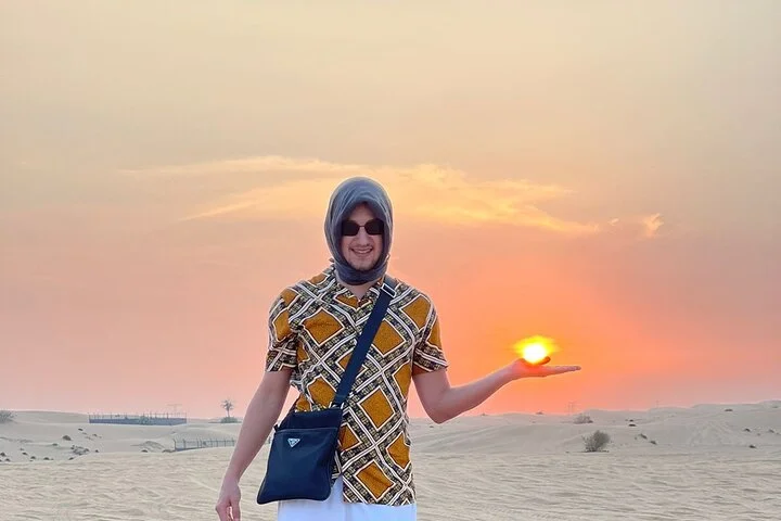 Dubai Red Dune Desert Safari with Camel Ride & BBQ Dinner