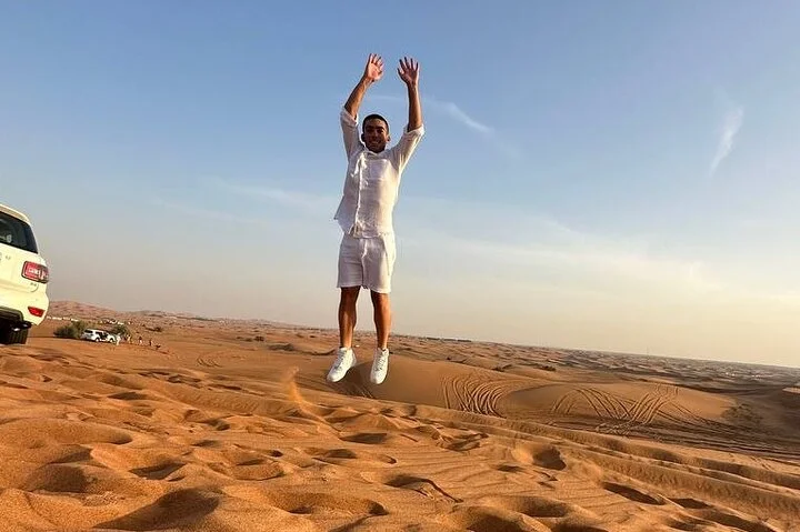 Dubai Red Dune Desert Safari with Camel Ride & BBQ Dinner