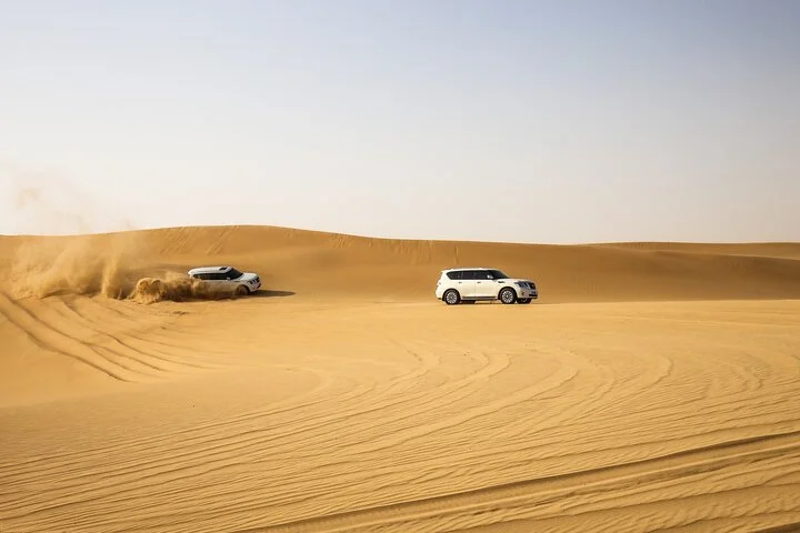 Dubai Red Dune Desert Safari with Camel Ride & BBQ Dinner