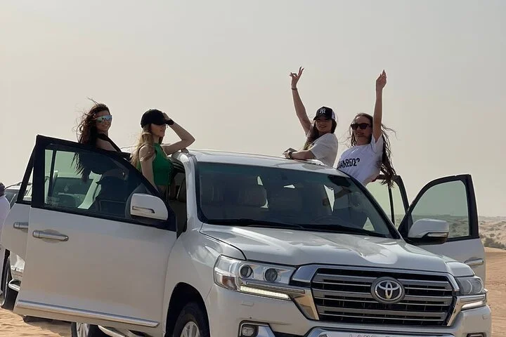 Dubai Red Dune Desert Safari with Camel Ride & BBQ Dinner