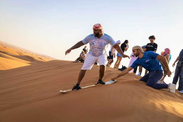 Dubai Red Dunes with Sandboarding, Camel Ride, Falcon & VIP Camp