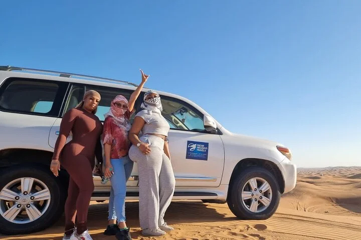 Dubai Red Dunes with Sandboarding, Camel Ride, Falcon & VIP Camp