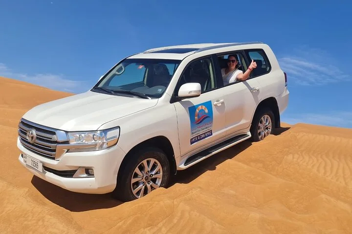 Evening Desert Safari Camel, Falcon, Sandboarding BBQ & Shows